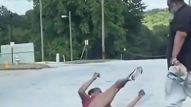 Crazy couple caught fighting & stripping themselves naked in public, exposing ass and pussy - 1 image