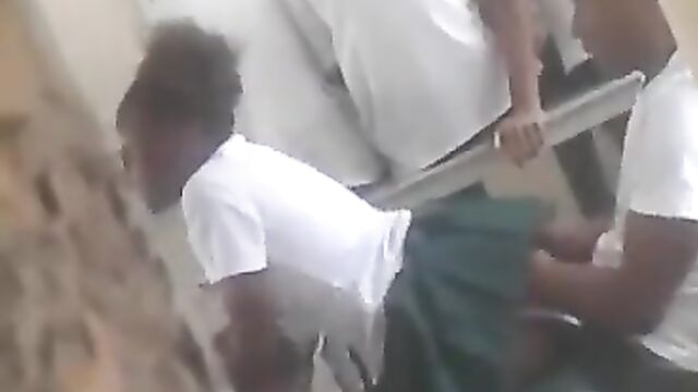 Students having discrete sex in class - 1 image