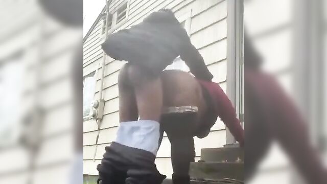 Horny black couple caught having sex outside in public - 4 image
