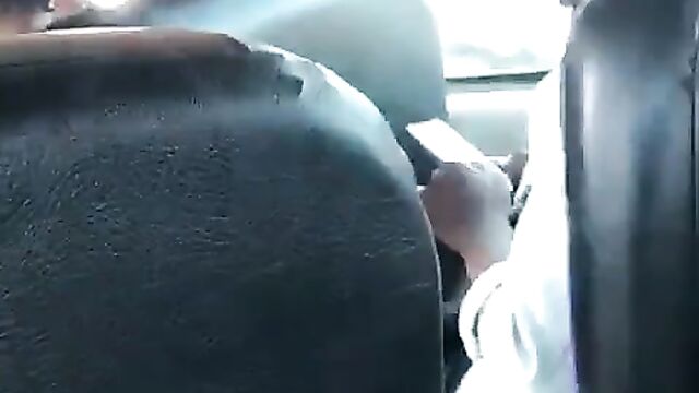 Guy caught masturbating on a bus - 1 image