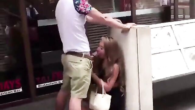 Crazy dude receiving head in public - 1 image