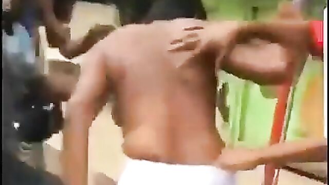 Big Girl beaten and stripped naked in public exposing boobs and ass, allegedly for stealing in Nigeria - 4 image