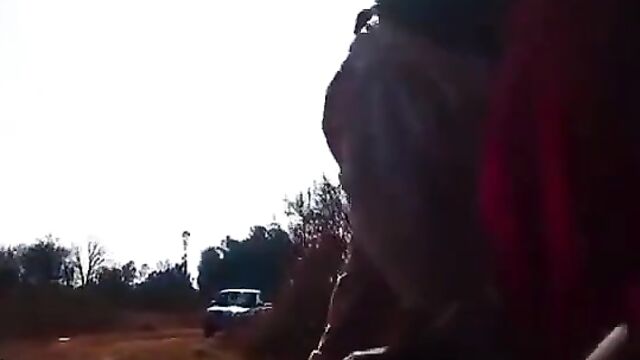 Couple caught doing it doggy style on the road in public - 4 image