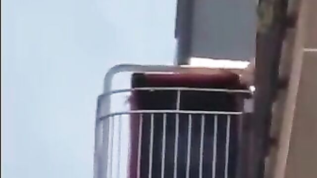 Bare breasts on the balcony - 4 image