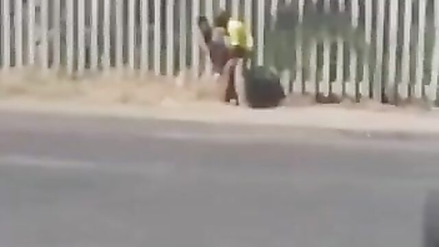 Mad Couple caught having sex by the roadside in public - 1 image
