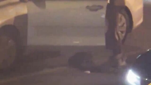 Man receiving head on the road in public - 1 image