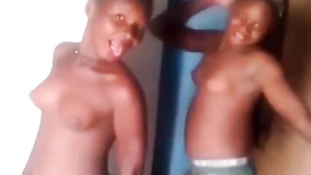 3 African girls showing their breasts and wilding on camera - 5 image