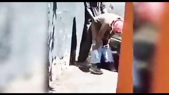 Mechanic caught having doggy style sex with a prostitute in public - 1 image