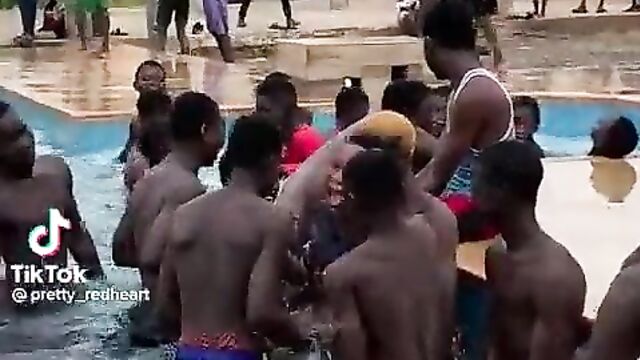 Teen boys fondling girls’ breasts in public in a swimming pool in Nigeria - 1 image