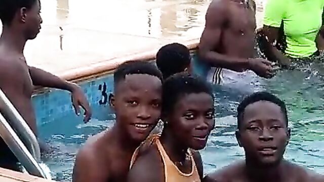 Teen boys fondling girls’ breasts in public in a swimming pool in Nigeria