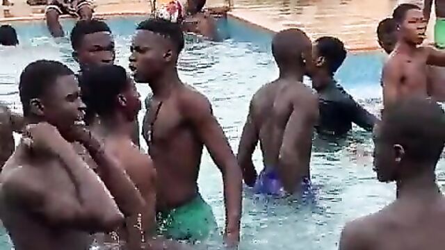 Teen boys fondling girls’ breasts in public in a swimming pool in Nigeria - 4 image