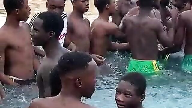 Teen boys fondling girls’ breasts in public in a swimming pool in Nigeria - 5 image