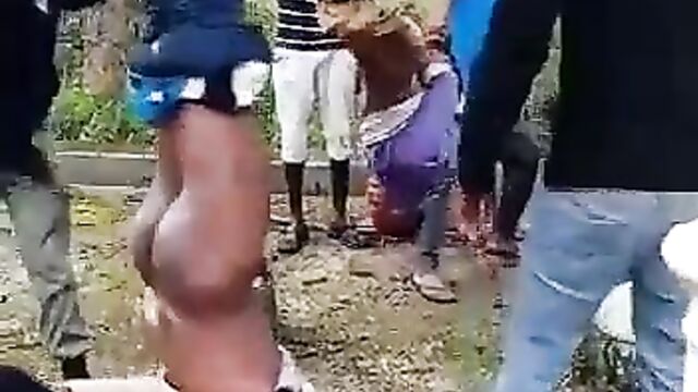 2 thieves stripped naked, hung upside down and beaten in public in South Africa - 1 image