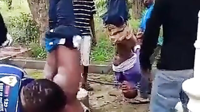 2 thieves stripped naked, hung upside down and beaten in public in South Africa - 4 image