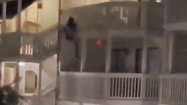 Woman caught cheating husband with side chick by climbing up storey building, and he fell off the building while trying to escape! - 1 image