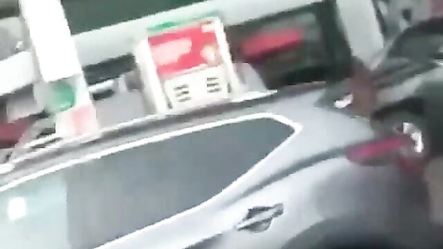 Naked woman seizes fuel pump and sprays petrol on customers in Nigerian petrol station - 1 image