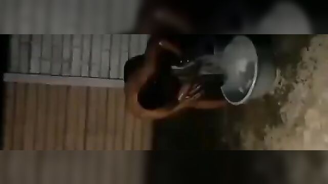 Busty whore stripped naked in public and forced to wash clothes for sleeping with married man