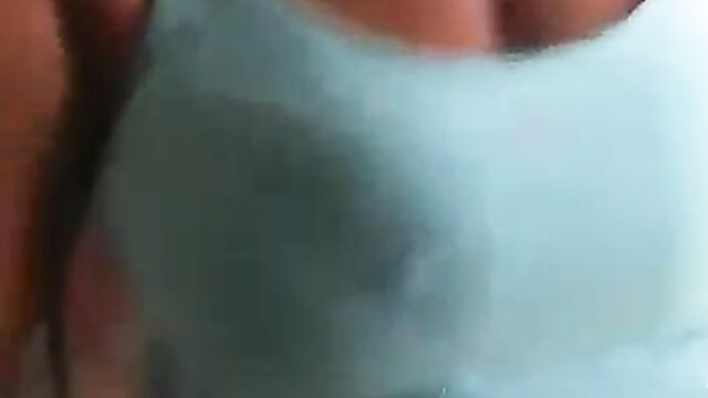 Ashawo sex worker shows her breast for less than $1 to a visitor at a brothel - 1 image