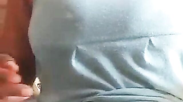 Ashawo sex worker shows her breast for less than $1 to a visitor at a brothel