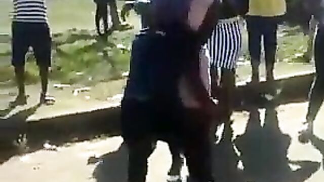 Girl strips her opponent and exposes her naked ass during fight - 4 image