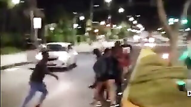 Ass & pussy exposed as thick chick fights in public - 1 image