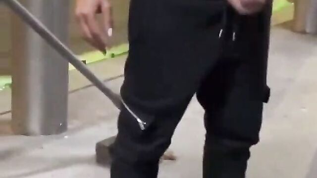 Crazy dude masturbates and pours his cum on sleeping homeless man in public!