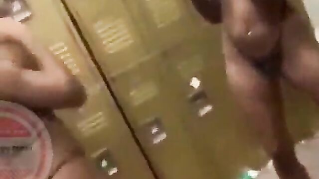 Boobs pop out in mad locker room fight between 2 strippers - 1 image