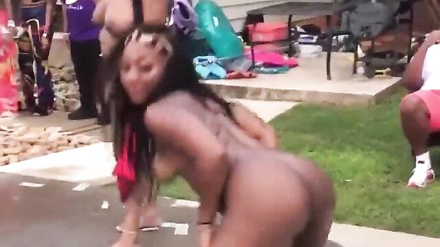 Naked strippers entertaining guests at a pool party for free money - 1 image