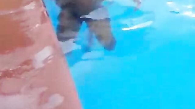 Guy caught squeezing girlfriend’s breasts in a pool – Part 1 - 1 image
