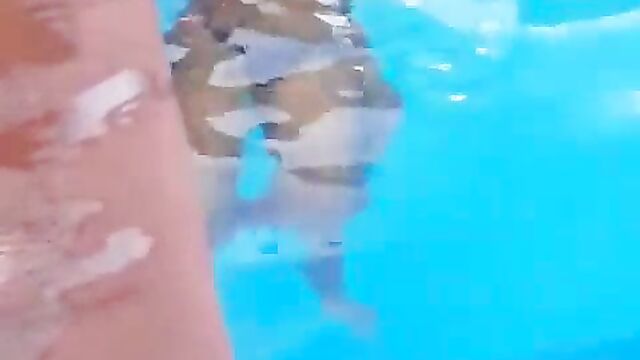 Guy caught squeezing girlfriend’s breasts in a pool – Part 1 - 4 image