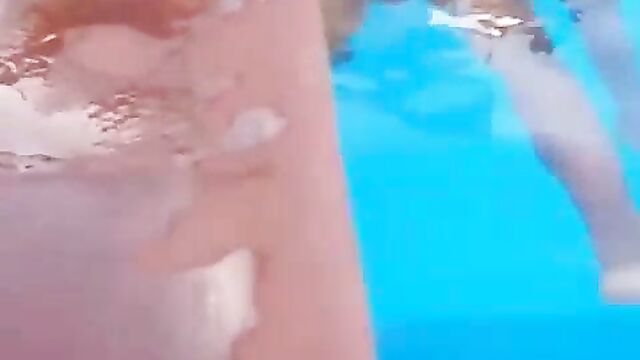 Guy caught squeezing girlfriend’s breasts in a pool – Part 1 - 5 image