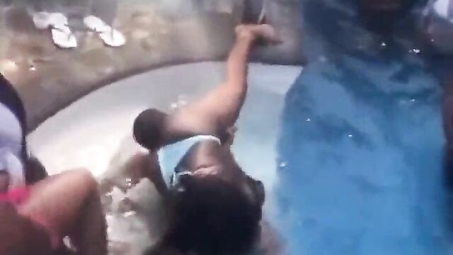 Licking pussy at a pool party - 1 image