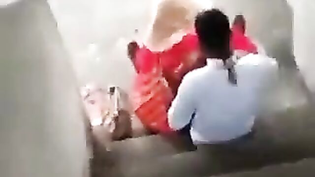 Couple caught having discreet sex on the stairs in public - 1 image