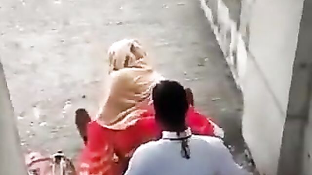 Couple caught having discreet sex on the stairs in public