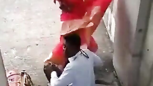 Couple caught having discreet sex on the stairs in public - 4 image