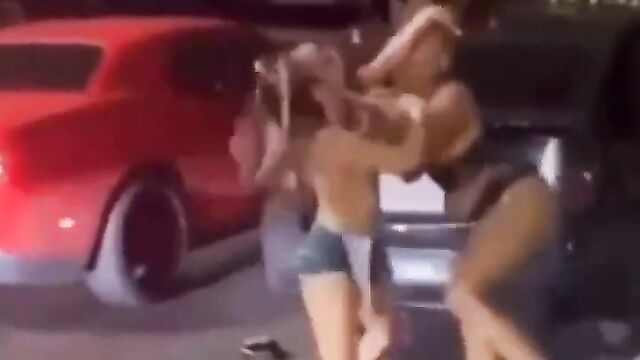 Ass and Boobs pop out in public as 2 ladies fight on the street over a rich man