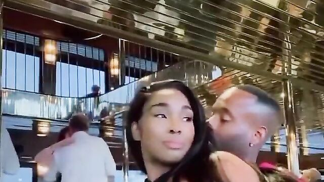Boyfriend pressing girlfriend’s breasts in public in a hotel - 1 image