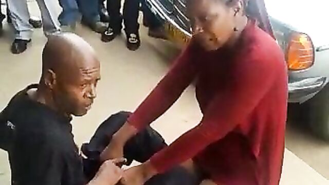 Chick caught trying to strip man naked in public - 4 image