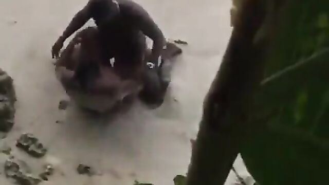 Naked randy couple caught having sex on the beach in public