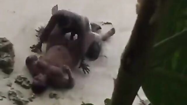 Naked randy couple caught having sex on the beach in public - 3 image