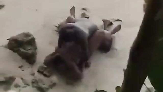 Naked randy couple caught having sex on the beach in public - 4 image