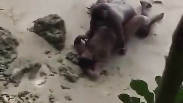 Naked randy couple caught having sex on the beach in public - 5 image