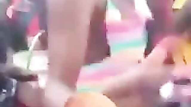 African sluts showing their naked breasts in public at a party in broad daylight - 4 image