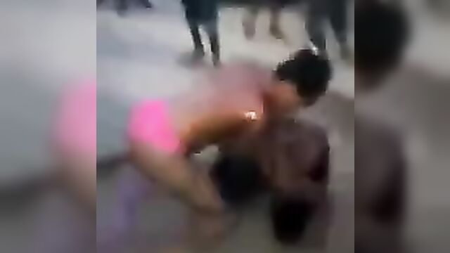 Big breasts exposed as Two girls strip naked to fight in public