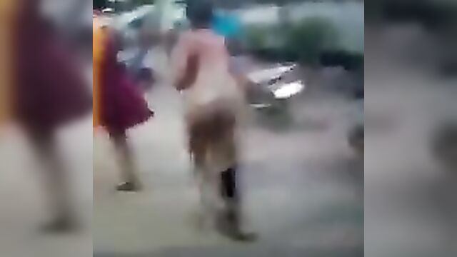 Big breasts exposed as Two girls strip naked to fight in public - 4 image