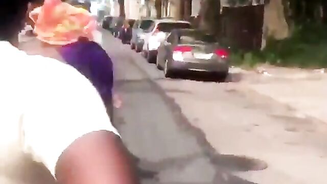 Breasts pop out as 2 women fight in public on the street - 1 image