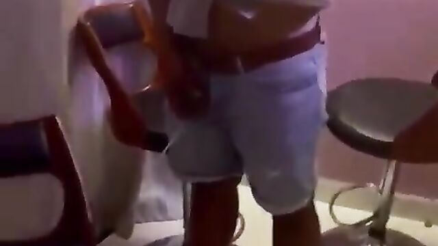 Drunk dude caught urinating on a chair at a party - 2 image