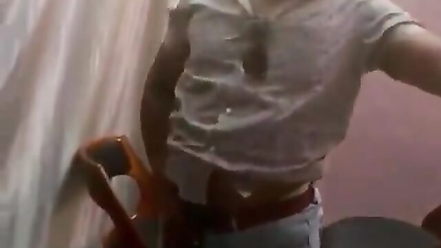 Drunk dude caught urinating on a chair at a party - 3 image