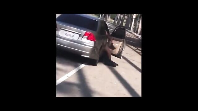 Dude holds on to wife’s car as she leaves him after she caught him cheating - 3 image