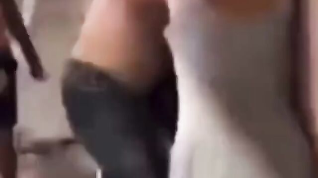 Man gets punched in the ass while fighting in public - 1 image